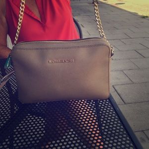 Beige Michael Kors cross body purse