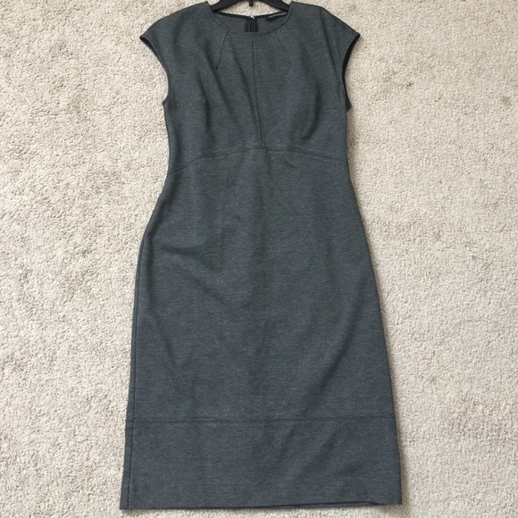 Below the knees gray fitted dress.