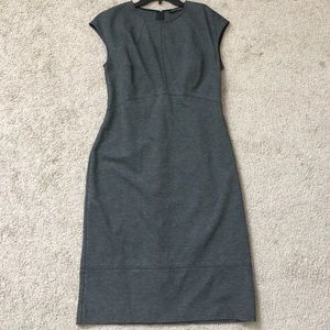 Below the knees gray fitted dress.