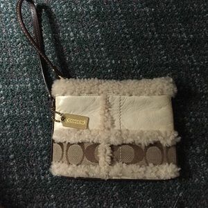 Coach fuzzy beige wristlet