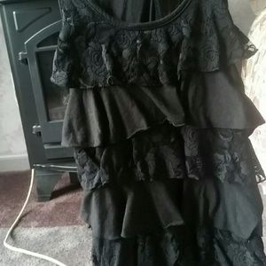 Ruffled lace black top