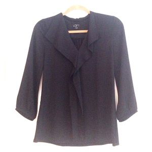 Black knit back polyester front v neck blouse.