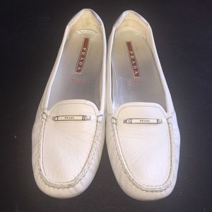 White Prada loafers