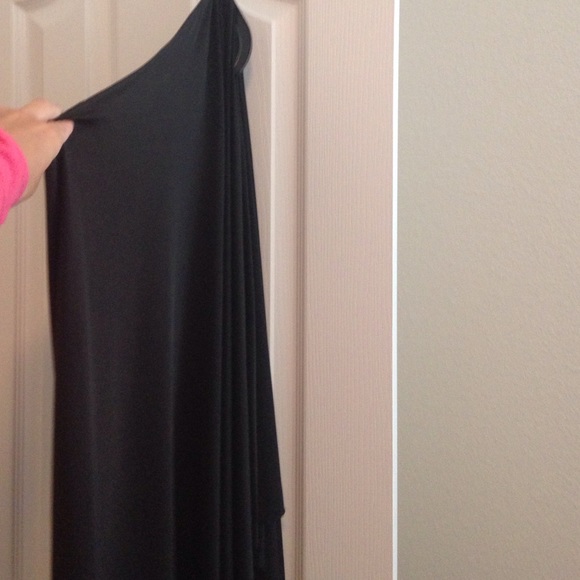 Never worn. One shoulder cape dress