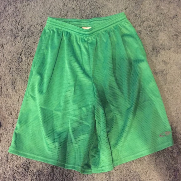 Green athletic shorts by champion. Never worn.