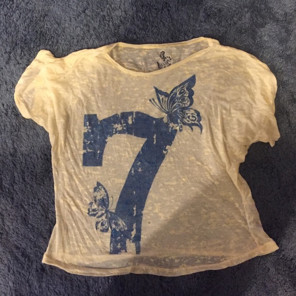 Yellow and blue shirt with the number 7 on it
