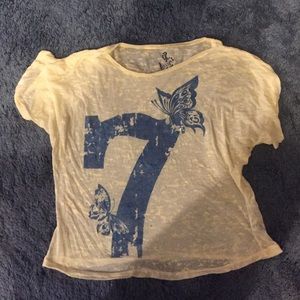 Yellow and blue shirt with the number 7 on it