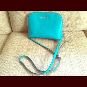 A medium blue Michael Kors bag!