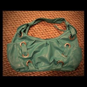 Teal handbag with silver accents