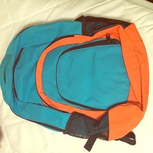 2 backpacks and a duffle bag