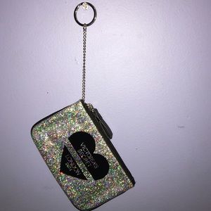 Mini purse to carry money etc.