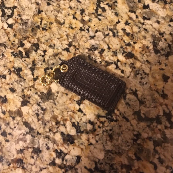 Coach brown leather tag