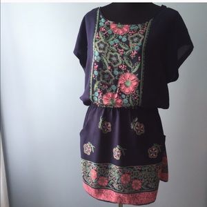 Dress with roll tab sleeves and pockets