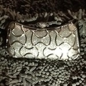 Grey sparkly clutch.