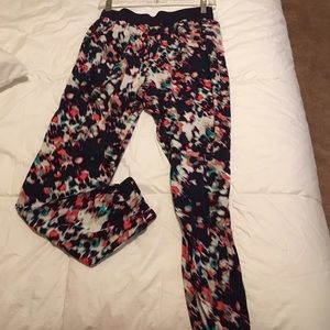 Navy and floral printed jogger style dress pants.