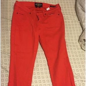 Tangerine skinny legs