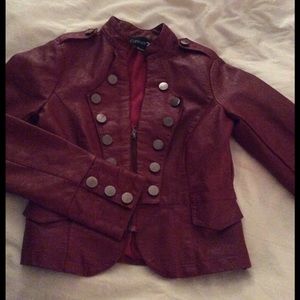 Red 'pleather' jacket with button detail.