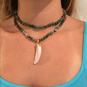 Stone beaded necklace with elephant tusk