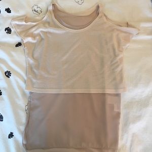 Cream top with shoulder cut out