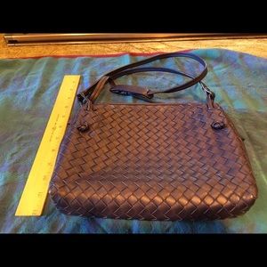 Blue Bottega Veneta crossbody leather purse.