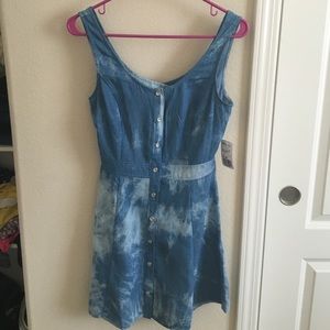 Acid wash button up dress with a Cutout Back