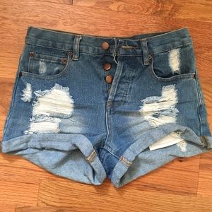 Ripped High-waisted denim shorts