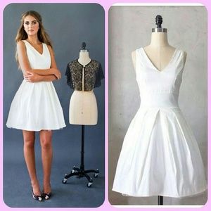 Soiree dress is white