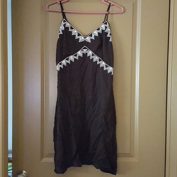 Black slip dress with white embroidery
