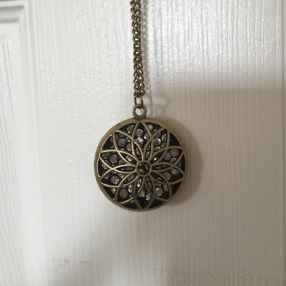 Long brass and jewel necklace