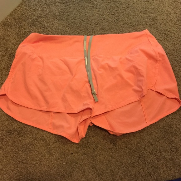 Coral Nike shorts