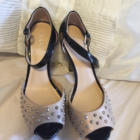 Studded cream and black strapped pumps