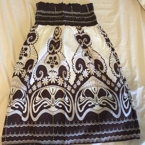 Brown and white printed bathing suit cover up.
