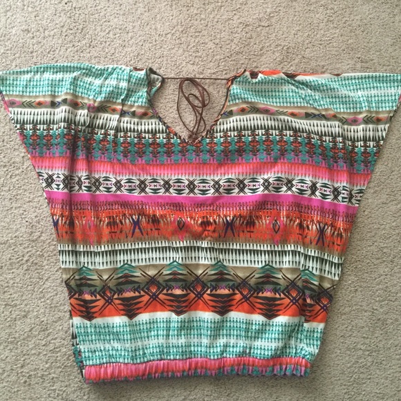 Multi colored top. Ties in the back.