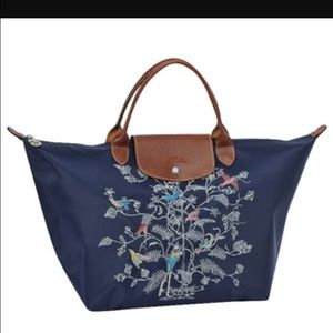 Longchamp small purse with bird motif