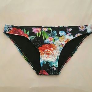 Vibrant floral black bikini bottom