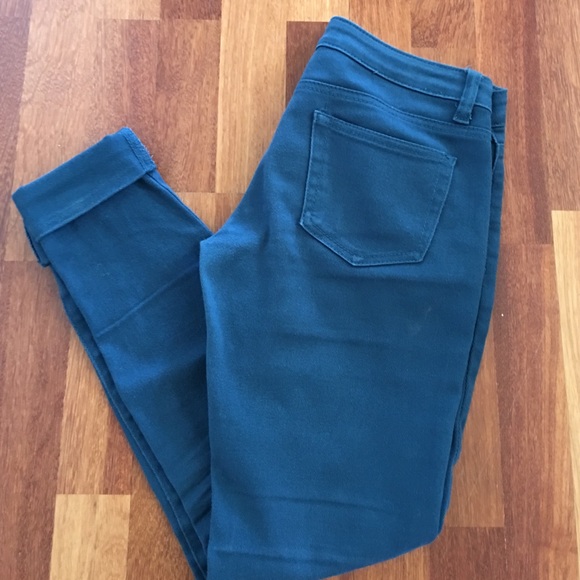 VIP brand dark teal skinny jeans.