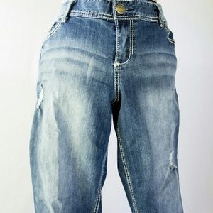 Washed and lightly stressed ankle rolled jeans