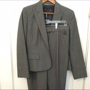 Gray & black pant suit with stitching detail.