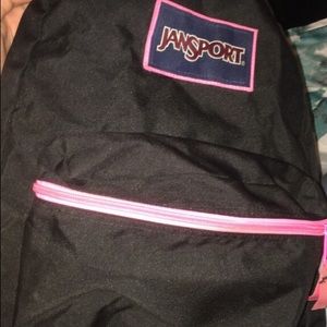 BLACK AND PINK JANSPORT