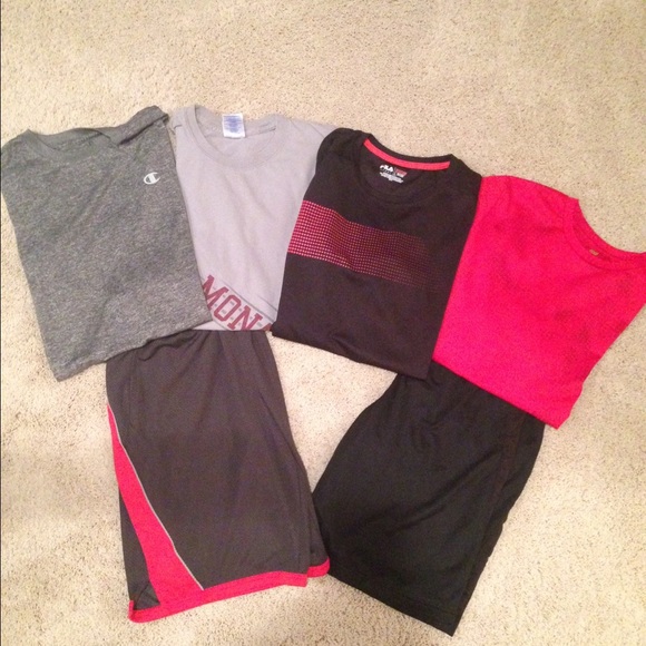 Lot of boys size large 14-16 shirts and shorts.