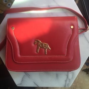 Cute red purse with horse buckle