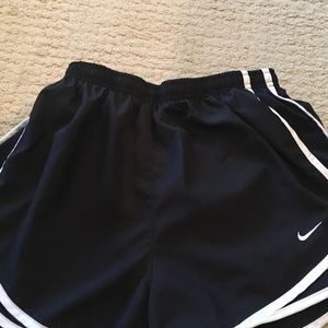 Brand new women's small black nike running short