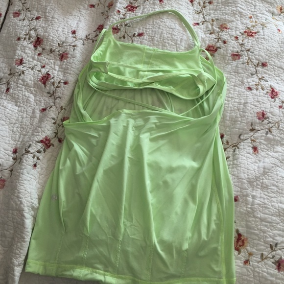 Lululemon top. Never worn. Open back. Size Medium - Picture 1 of 3