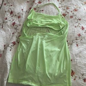 Lululemon top. Never worn. Open back. Size Medium