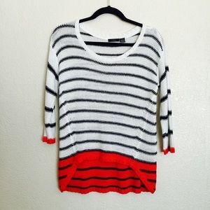 High-low cozy knit sweater.