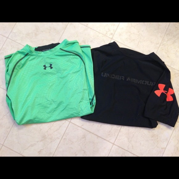 Boys size large Under Armour shirts.