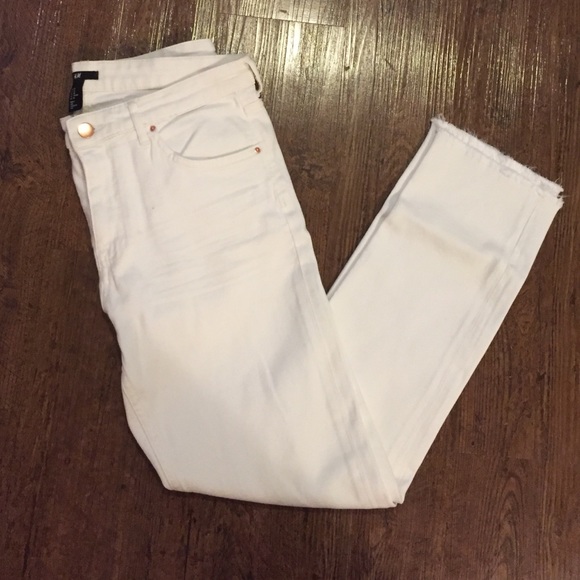 Never been worn white denim with distressed knees