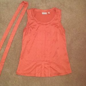 Satin, tangerine colored top