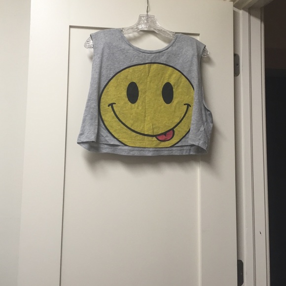 A smiley face crop top that is in good condition.
