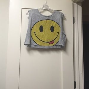 A smiley face crop top that is in good condition.